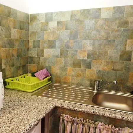 Holiday home Locazione Turistica Olivastro 1